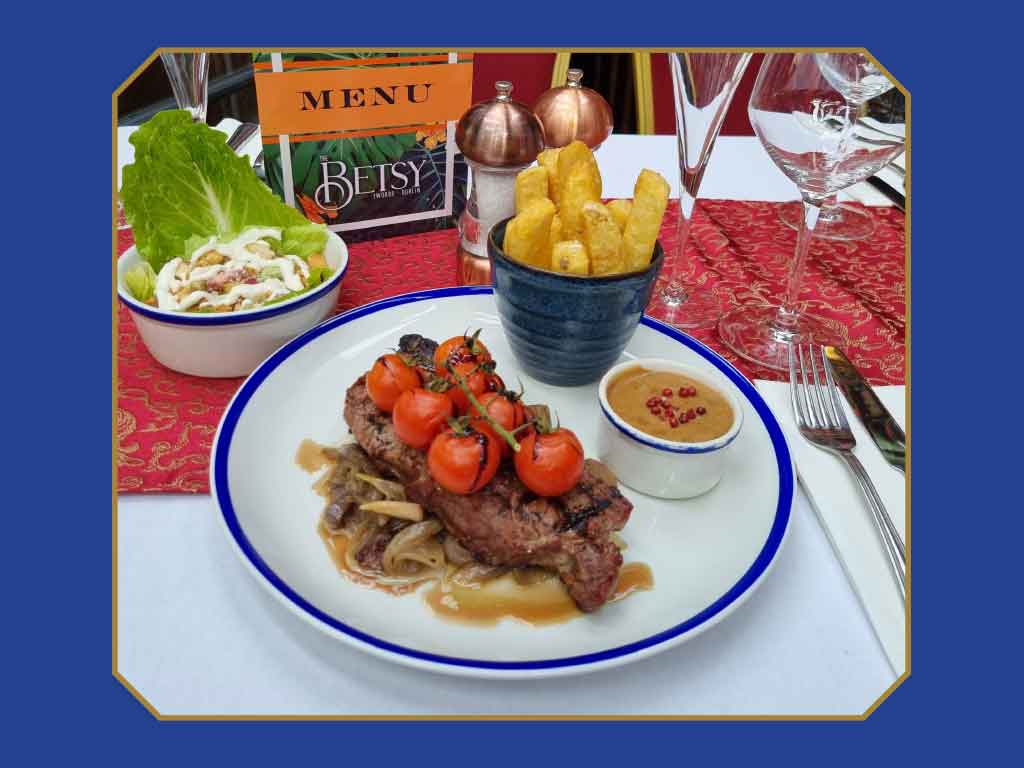 Betsy-Steak-Special Betsy Garden and Terrace swings with brick wall